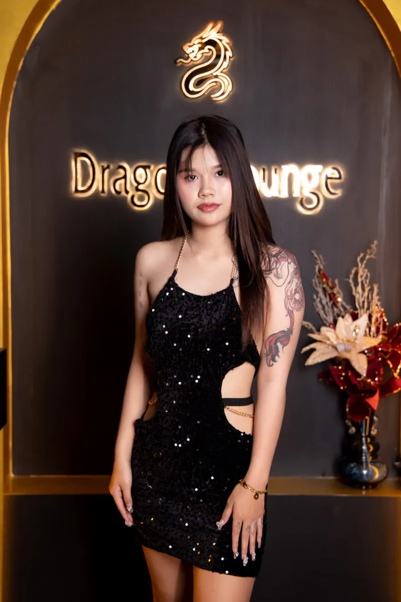 Dragon Heart Bangkok therapist — portrait with dragon tattoo